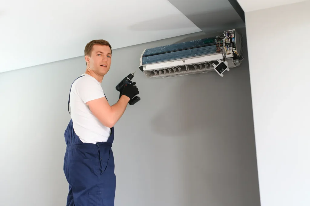 HVAC technician installing a mini-split.